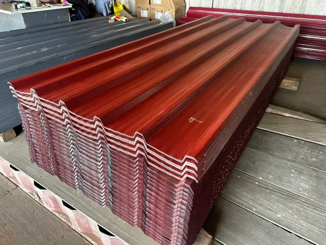 0.35mm Aluzinc rough matte roofing sheet with ribbed texture - available in dark grey, wine red, green, and terracotta